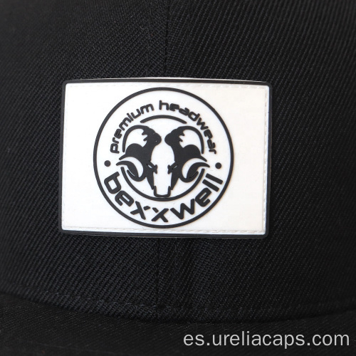 Tapa de snapback de lana con logotipo de goma